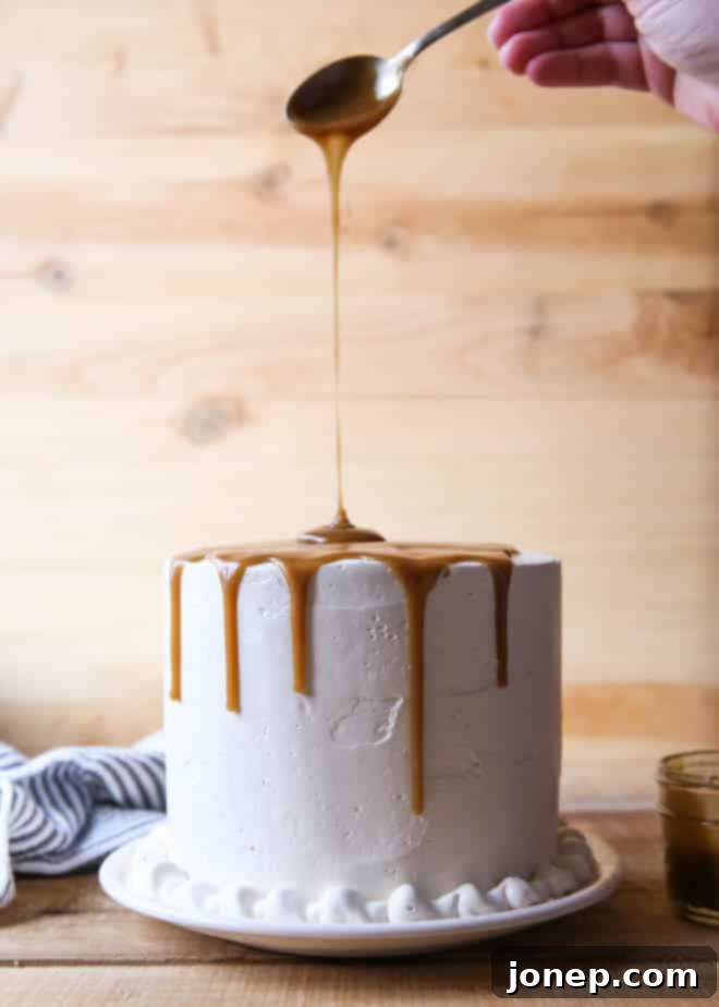 A beautiful top-down view of the Bourbon Butterscotch Cake, highlighting its perfect round shape and glistening topping.