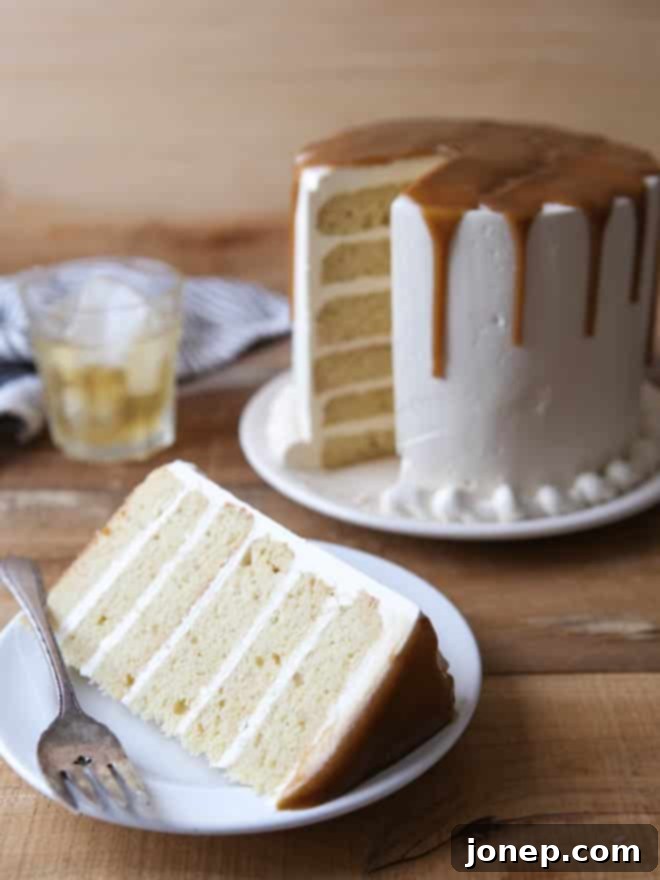 Multiple slices of Bourbon Butterscotch Cake artfully arranged on a serving plate.