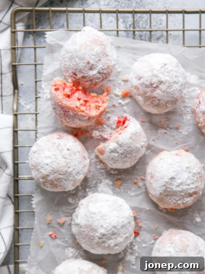 cherry almond snowballs with bite taken out