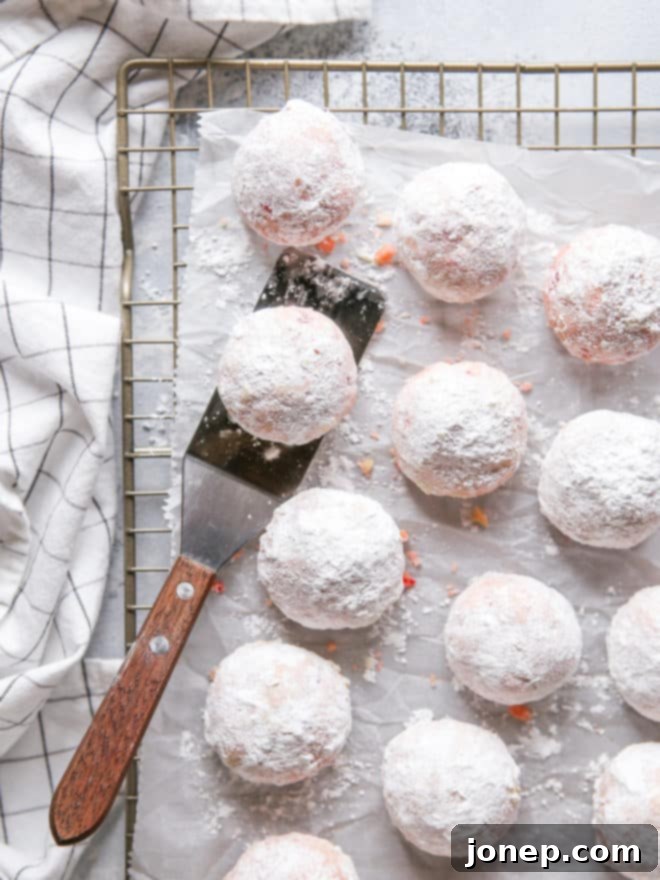cherry almond snowballs dusted in powdered sugar