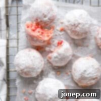 cherry almond snowballs with bite taken out