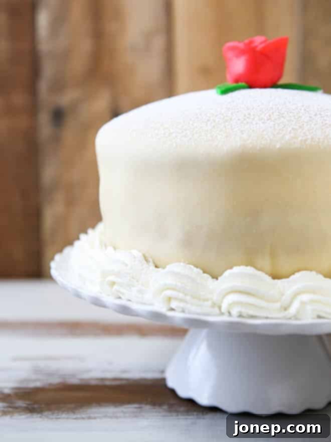 Princess Cake - sponge cake with vanilla and raspberry filling covered with marzipan | completelydelicious.com