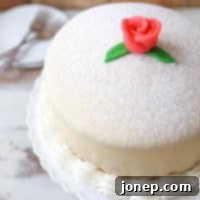 Princess Cake 9 Princess Cake - sponge cake with vanilla and raspberry filling covered with marzipan | completelydelicious.com