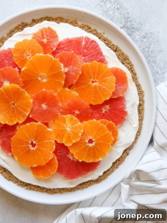 Bright Citrus Yogurt Pizza with Crunchy Granola Crust 2 Vibrant Citrus and Yogurt Fruit Pizza with a Crunchy Granola Crust