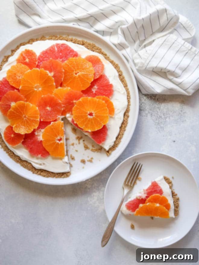 Bright Citrus Yogurt Pizza with Crunchy Granola Crust 7 Overhead view of a beautifully arranged Citrus and Yogurt Fruit Pizza