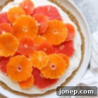Bright Citrus Yogurt Pizza with Crunchy Granola Crust 8 Citrus and Yogurt Fruit Pizza with Granola Crust | completelydelicious.com