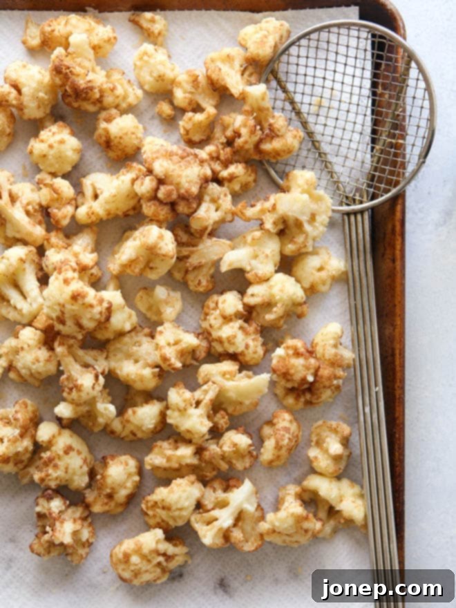 Light and Crispy Cauliflower Tempura 5 Crispy Tempura Cauliflower with a side of creamy spiced yogurt dipping sauce