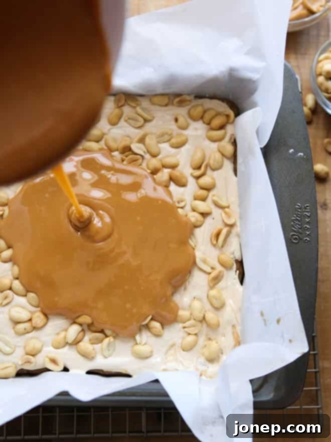 Salted Caramel Peanut Bars neatly arranged on a cooling rack after baking.