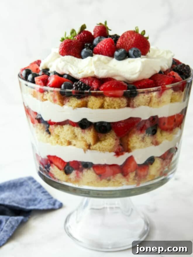 Berry Infusion Cake 11 Beautiful summer berry trifle in a clear trifle dish