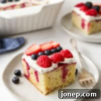 Berry Infusion Cake 14 Homemade Berry Poke Cake with fresh berries and whipped cream