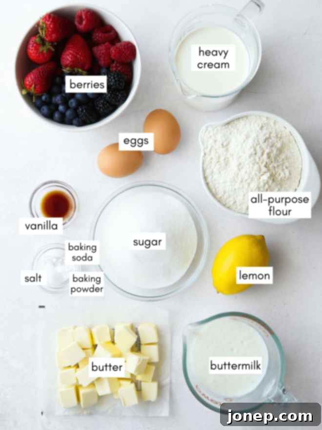 Berry Infusion Cake 4 A selection of fresh berries and cake ingredients laid out on a table