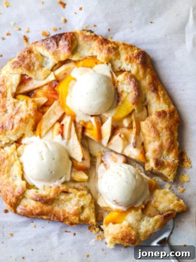 Golden Peach Apple Delight 2 sliced peach apple galette with ice cream