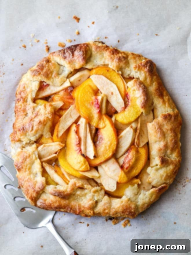 Golden Peach Apple Delight 8 baked peach apple galette on pan