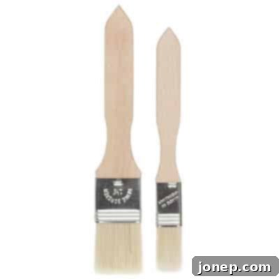 A soft bristle pastry brush, used for applying egg wash to pie crusts.