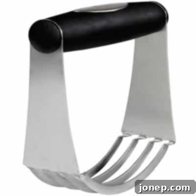 A stainless steel pastry blender, an essential tool for cutting butter into flour for flaky pie crust.