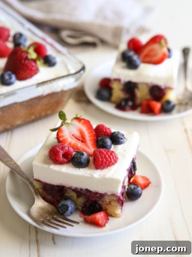 This homemade berry poke cake is perfect for summer celebrations