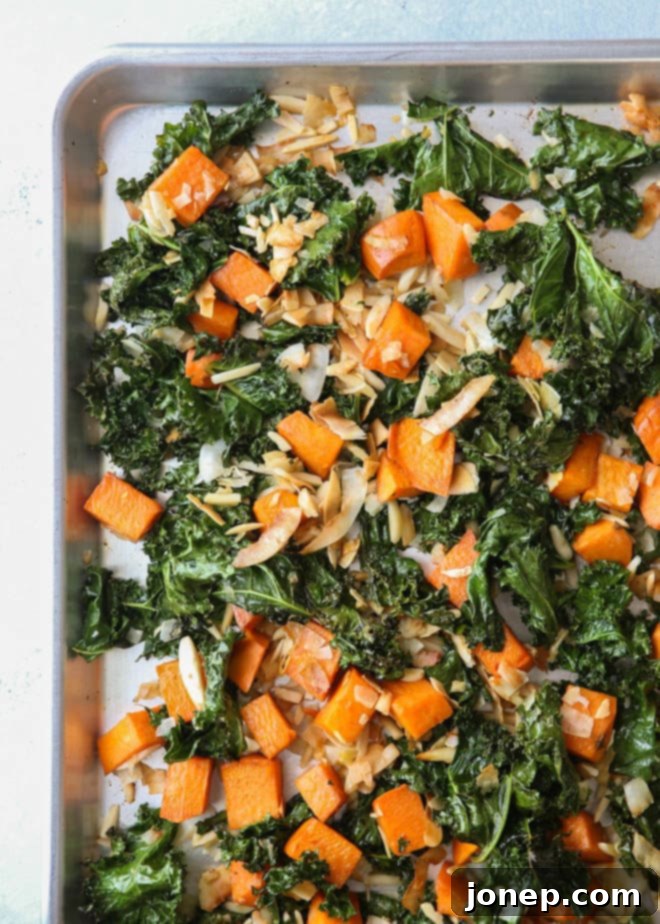 Roasted sweet potatoes and kale with shredded coconut and almonds