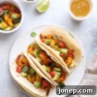 Mumbai Street Shrimp Tacos 6 Mumbai spiced shrimp tacos with avocado salsa