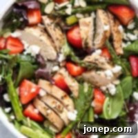 A top-down view of the Strawberry and Asparagus Salad with Chicken