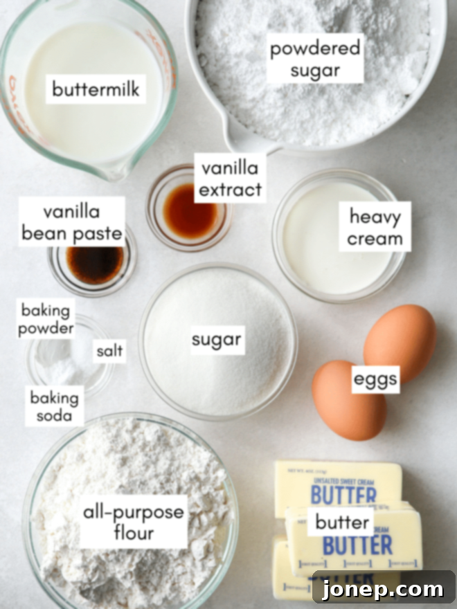 Classic Vanilla Cupcakes 4 Ingredients for vanilla cupcakes laid out on a kitchen counter.