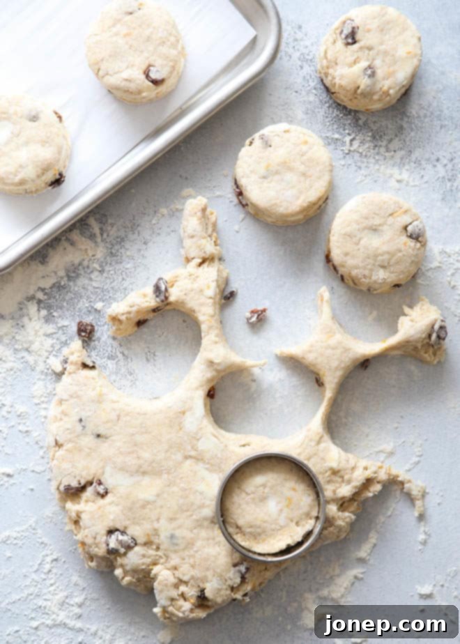 Cutting out hot cross biscuits