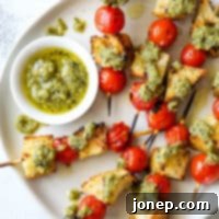These grilled bruschetta skewers with ricotta pesto are an easy summer appetizer!