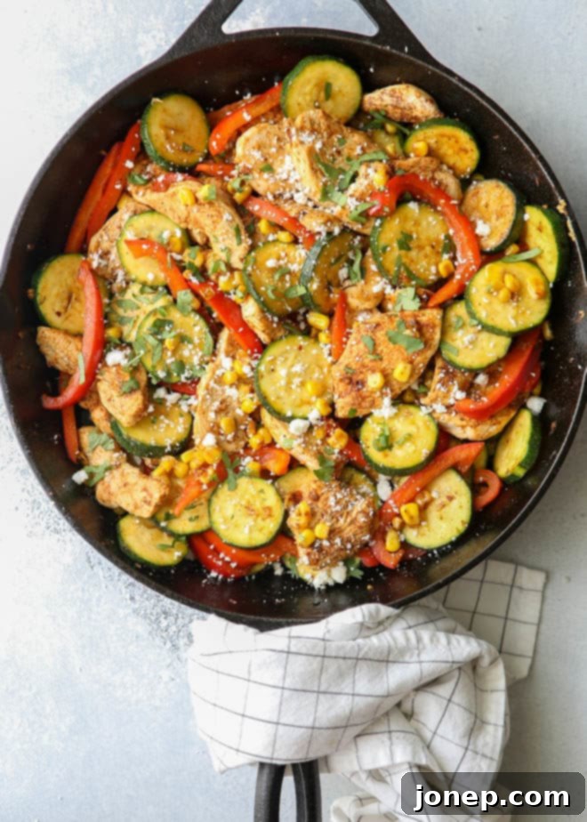 This southwest chicken skillet with zucchini, bell peppers, and corn is a delicious and healthy summer meal!
