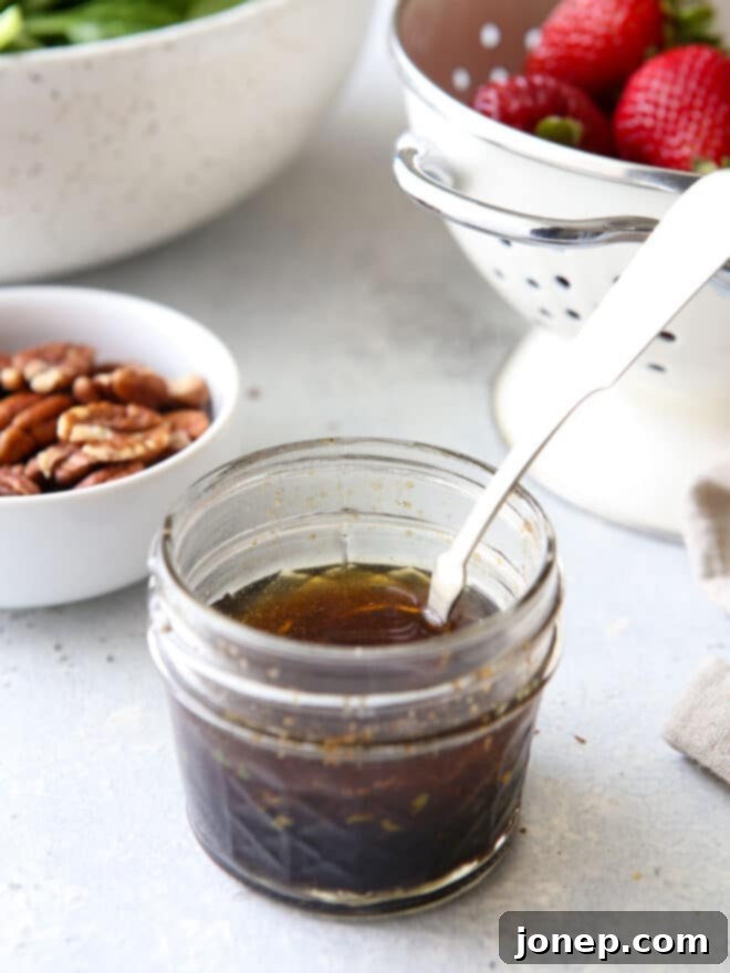 Warm Brown Butter Strawberry Spinach Salad 4 warm brown butter dressing in a jar