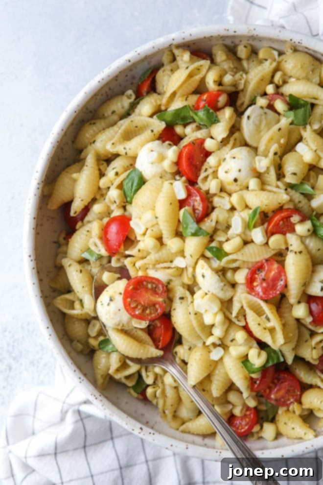 This fresh corn, tomatoes, pesto and mozzarella salad is perfect for summer!