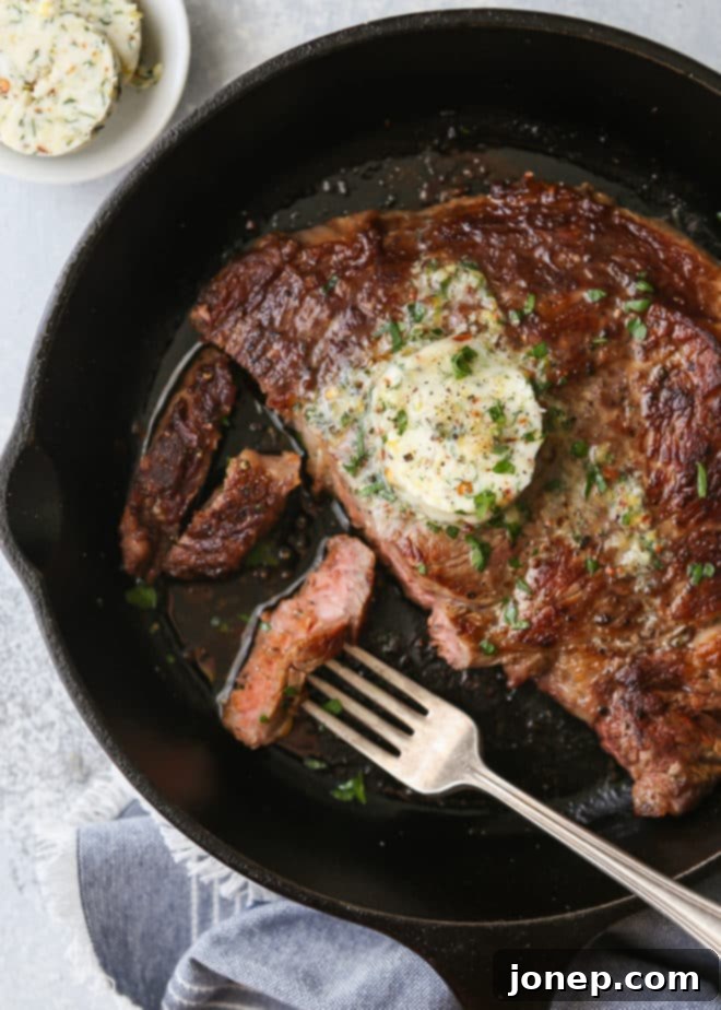 Grilled ribeye steaks with cowboy butter