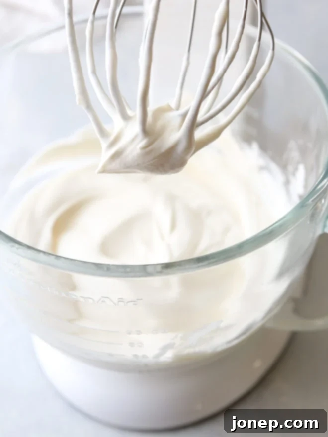 Achieve Flawless Whipped Cream 2 How to make perfectly whipped cream, a beautiful bowl of freshly whipped cream