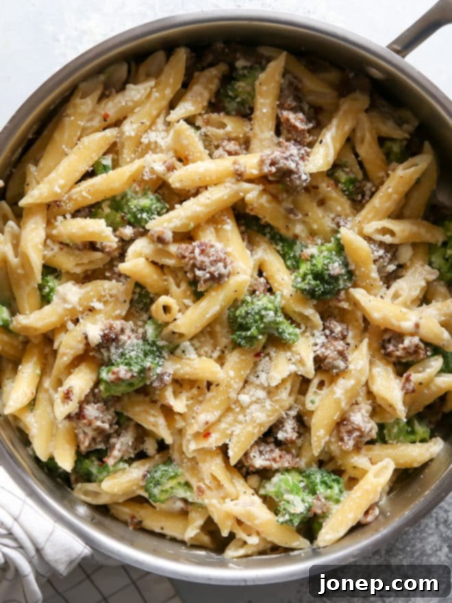 One-pot sausage and broccoli pasta served in a large bowl, ready to eat