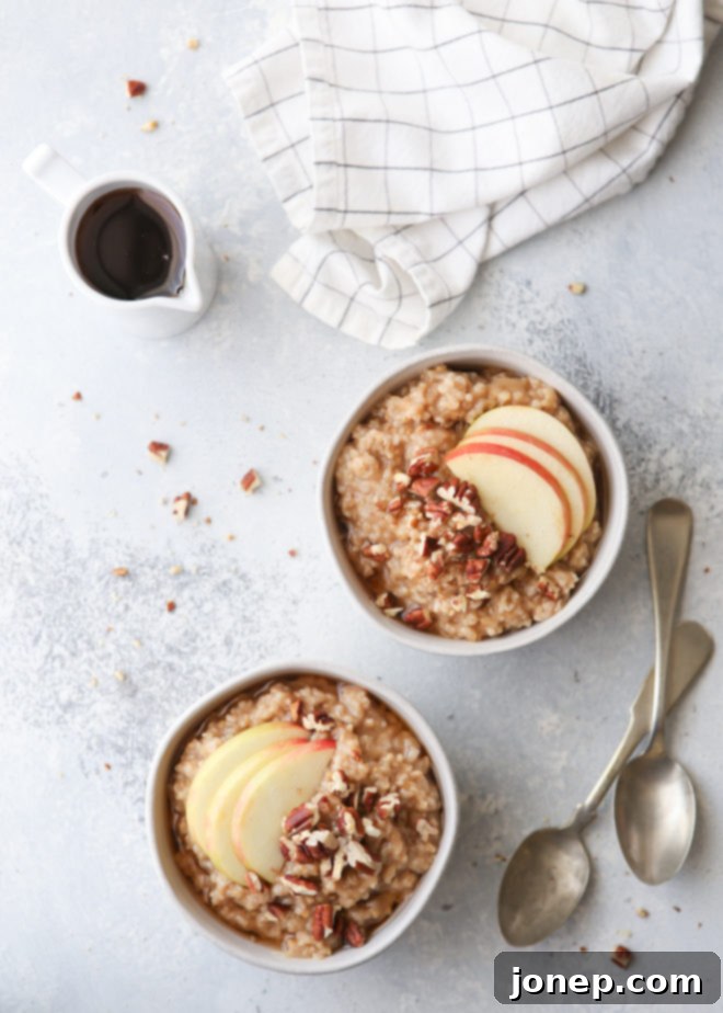 These apple cinnamon oatmeal bowls made in the pressure cooker and topped with pecans and maple syrup are perfect for fall!
