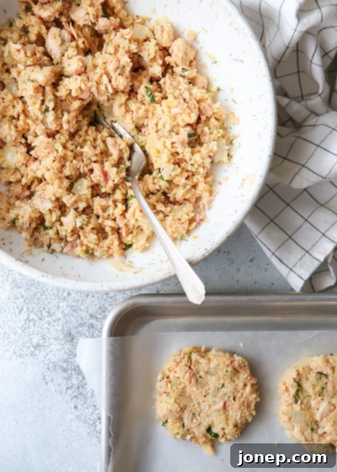 Shaping homemade salmon patties by hand