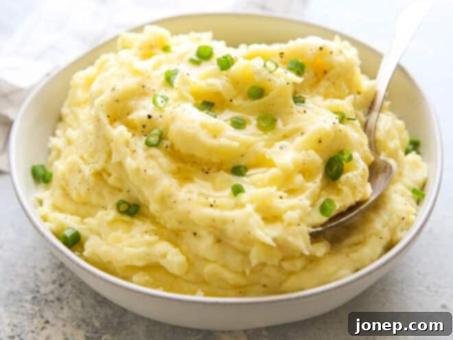 Master the Art of Creamy Fluffy Mashed Potatoes 11 mashed potatoes in bowl with scallions