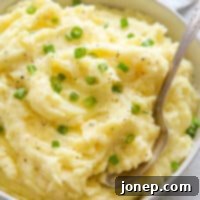 Master the Art of Creamy Fluffy Mashed Potatoes 12 mashed potatoes in bowl with scallions