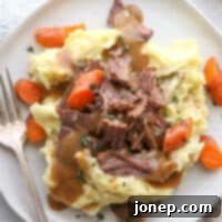 This classic pot roast recipe cooked in the slow cooker is fall-apart tender and full of so much flavor.