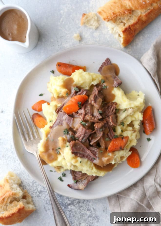 This classic pot roast recipe cooked in the slow cooker is fall-apart tender and full of so much flavor, ready to be enjoyed.