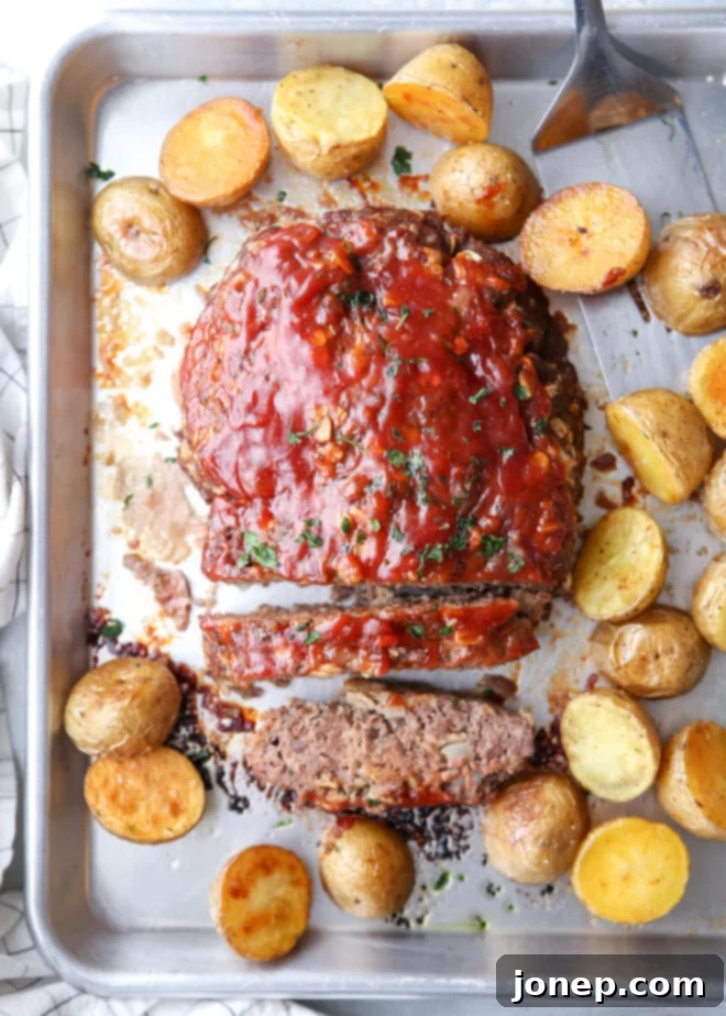 My favorite meatloaf and roasted potatoes cooked together on 1 pan!