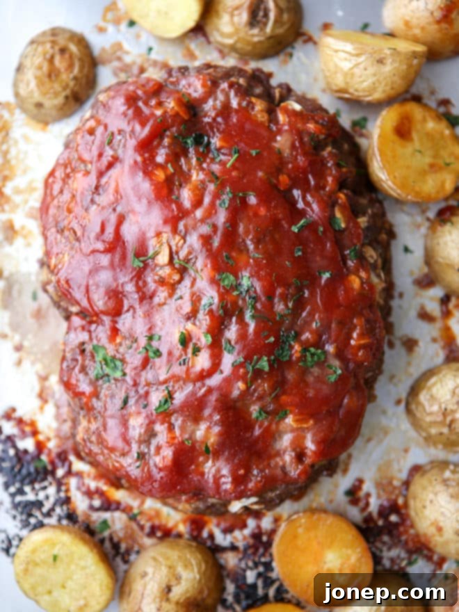 My favorite meatloaf and roasted potatoes cooked together on 1 pan!