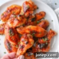 Sweet Heat Maple Chicken Wings 5 Crispy oven-baked chicken wings with a sweet and spicy maple glaze.