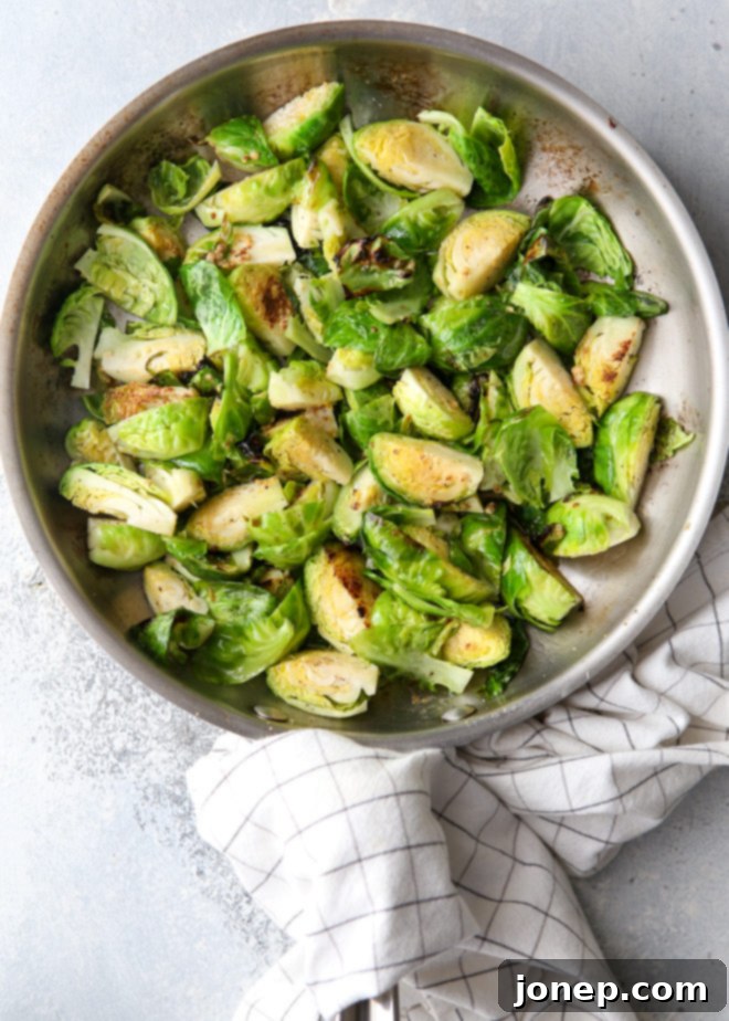 Flavorful and delicious brussels sprouts sauteed with maple syrup and dijon mustard