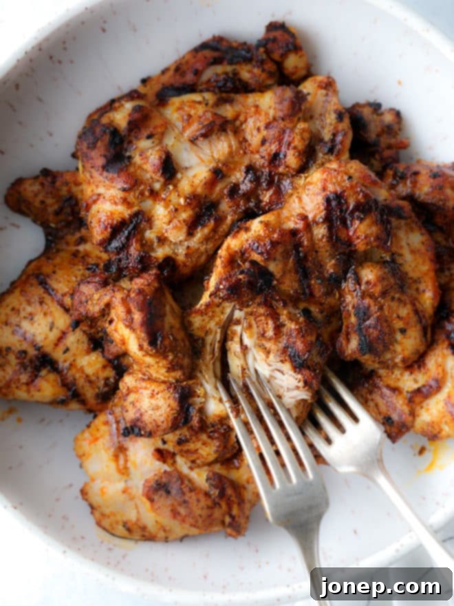 Spiced and grilled chicken thighs to be shredded for the easiest Mexican street tacos