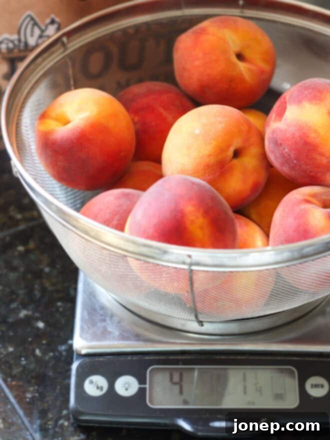 Preserving Summer: A Guide to Canning Peaches 4 Fresh, ripe peaches being weighed on a kitchen scale for canning