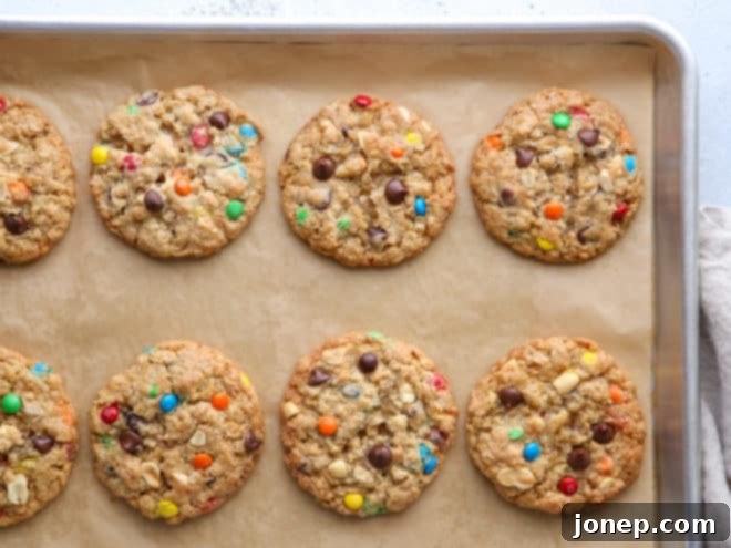These extra-large monster cookies are the ultimate cookie! They're packed with M&Ms, oats, chocolate chips, peanuts, and crispy rice cereal. 