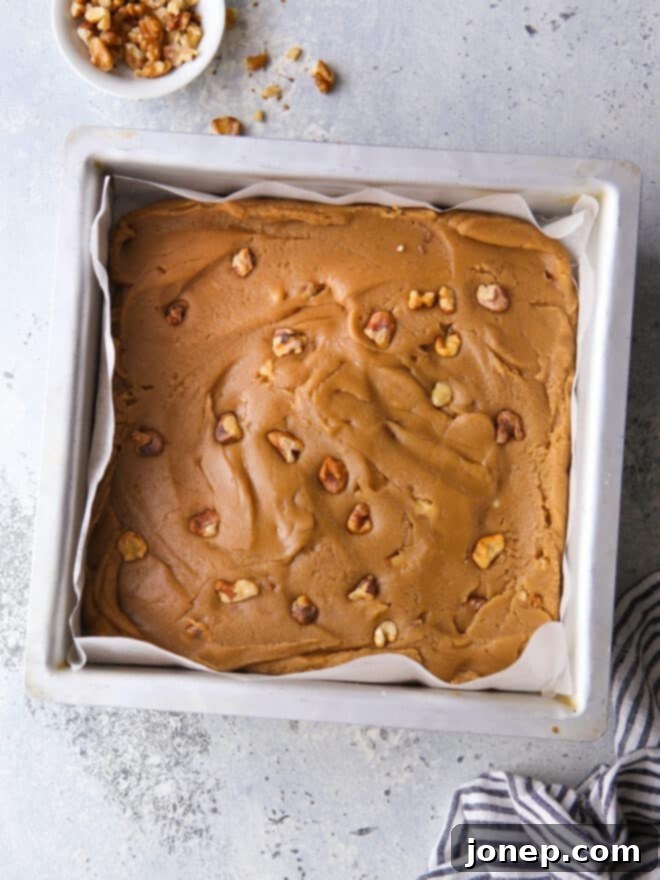 Golden Penuche Brown Sugar Fudge 6 brown sugar fudge cooling in an 8x8 square pan
