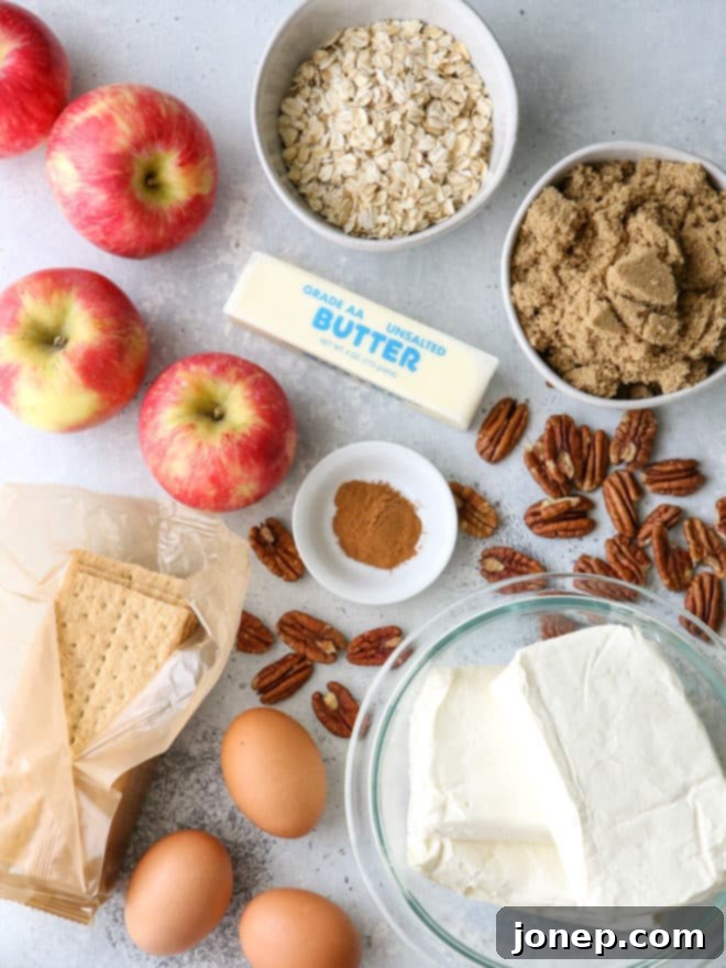 Essential ingredients needed for making rich and creamy caramel apple cheesecake bars from scratch.