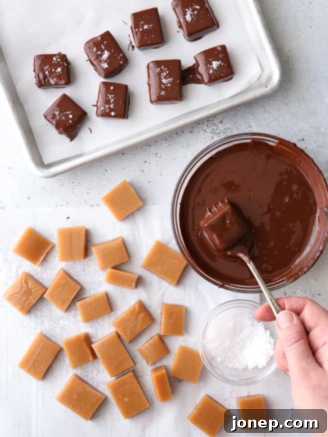 Covering homemade caramels with chocolate