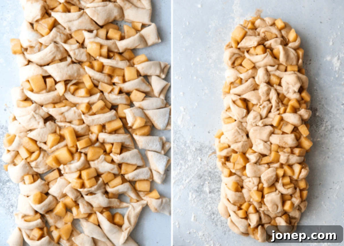 Cutting the apple-filled dough into uneven strips and chunks with a bench scraper for fritter texture