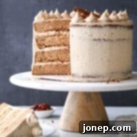 Golden Brown Sugar Cinnamon Stack 7 A slice of brown sugar cinnamon layer cake, showing moist layers and fluffy frosting.